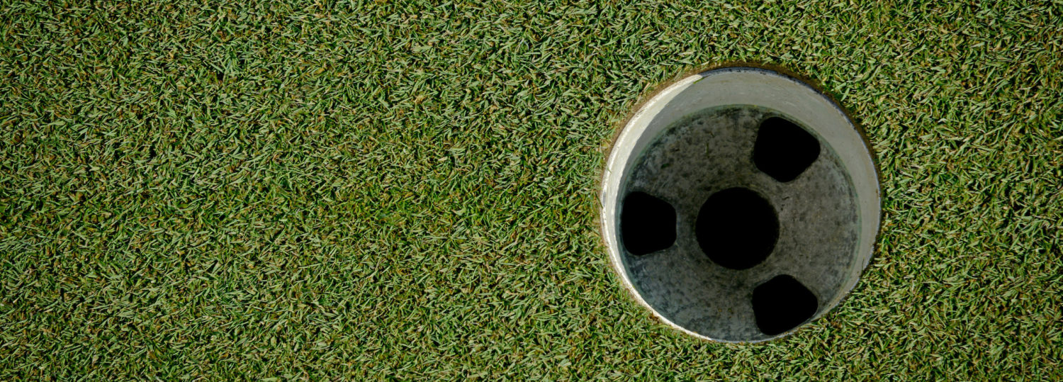 Close-up of a hole at Lonnie Poole Golf Course.