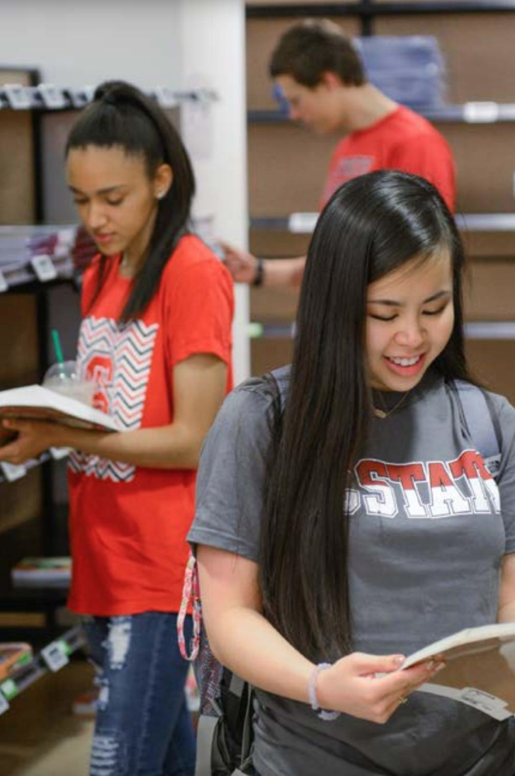 Students shop for textbooks at the bookstore.