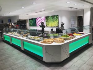 Salad bar with food on it